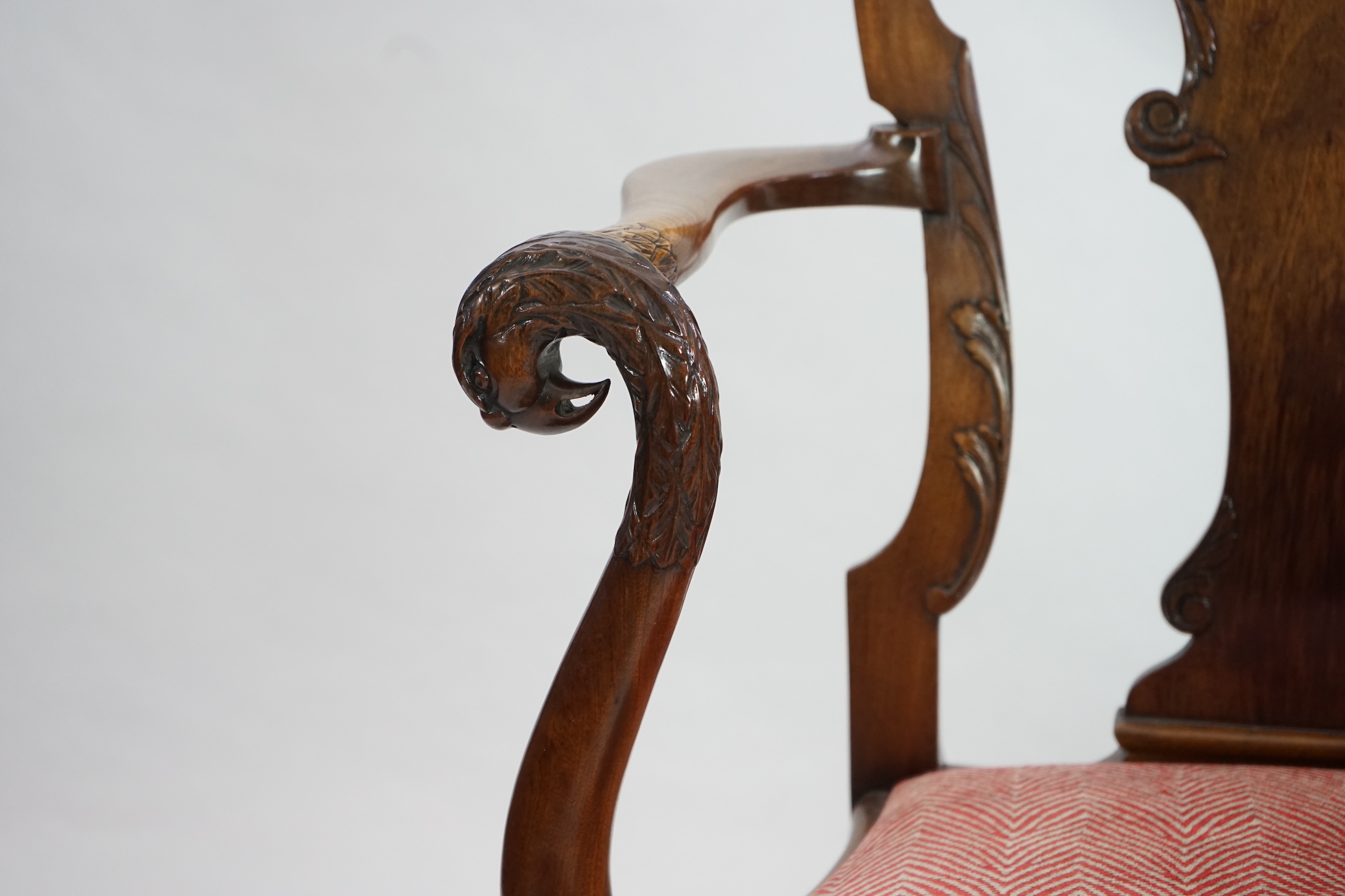 A set of twelve Queen Anne revival walnut dining chairs, including two carvers